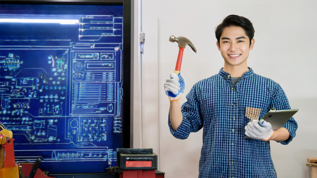 Junger Mensch mit Werkzeug vor Workshop, Symbol für selbstbestimmte Handwerkskarriere